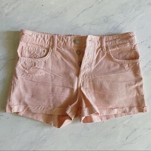 Faded pink H and M shorts